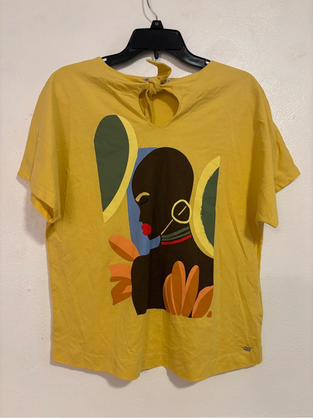 Purificacion Garcia Yellow Tie Graphic Tee